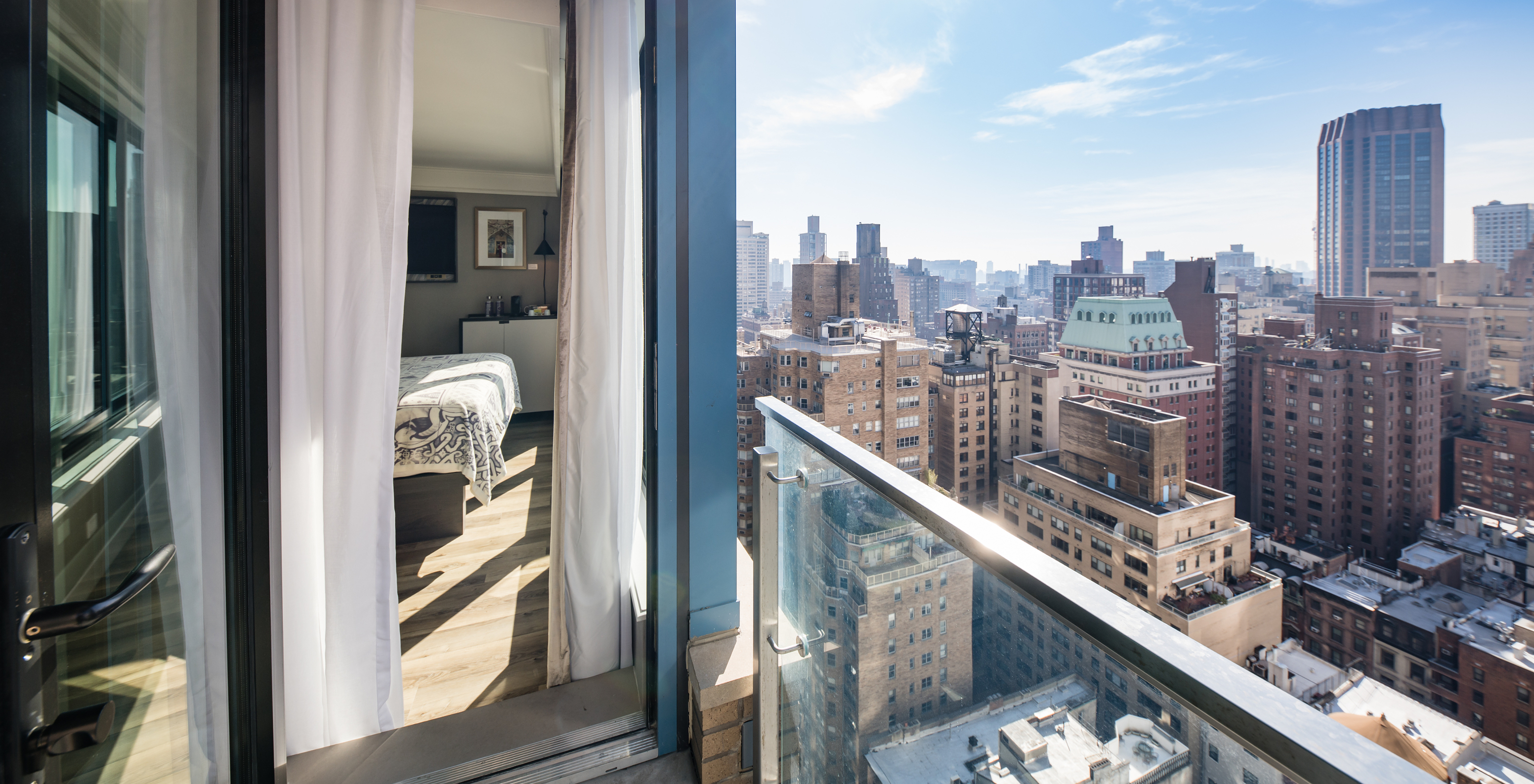 Das Zimmer mit Balkon im Pestana Park Avenue hat einen Balkon mit Panorama-View auf Manhattan