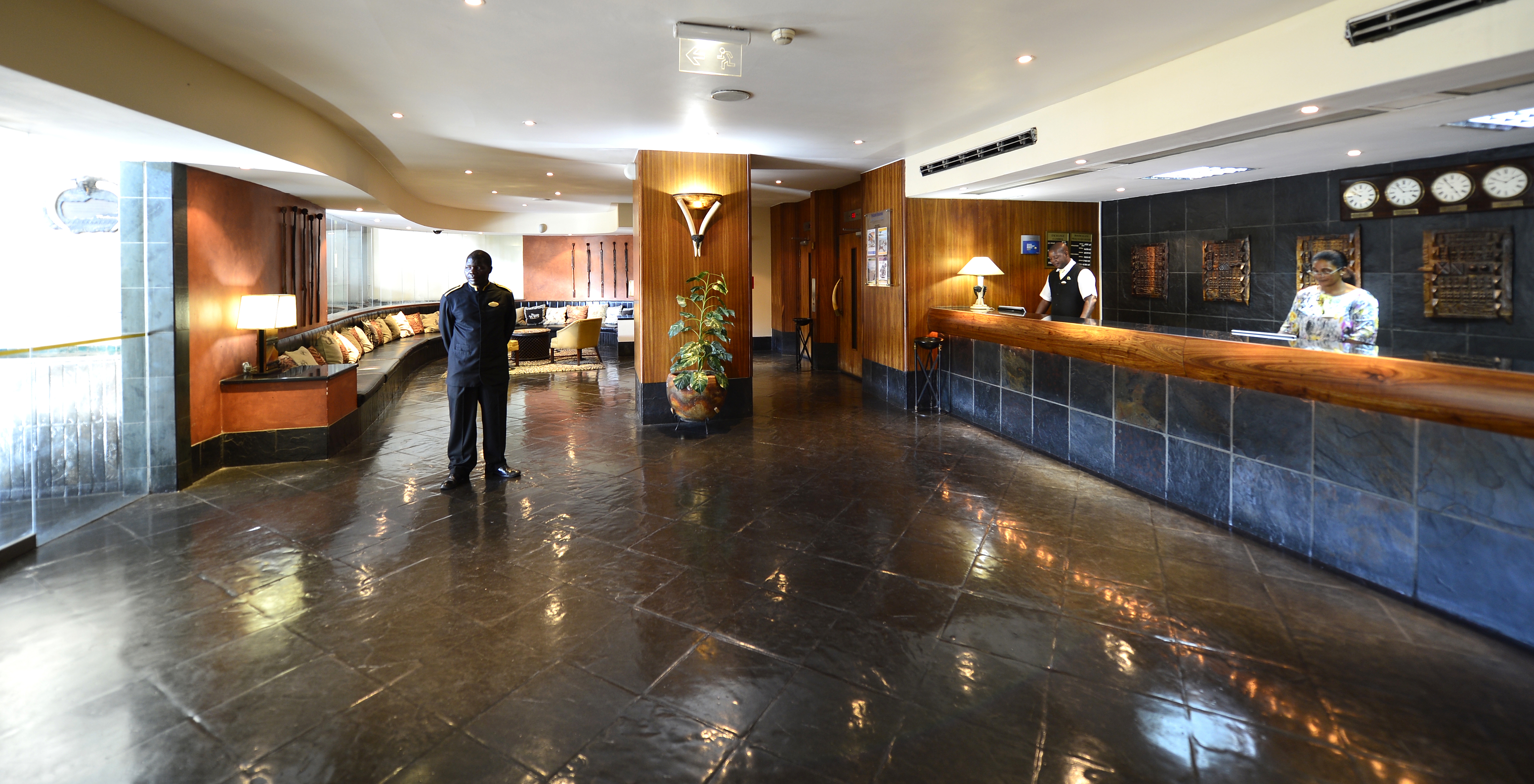 Entrance of Pestana Rovuma, a hotel in central Maputo, with typical African decor in black and brown tones