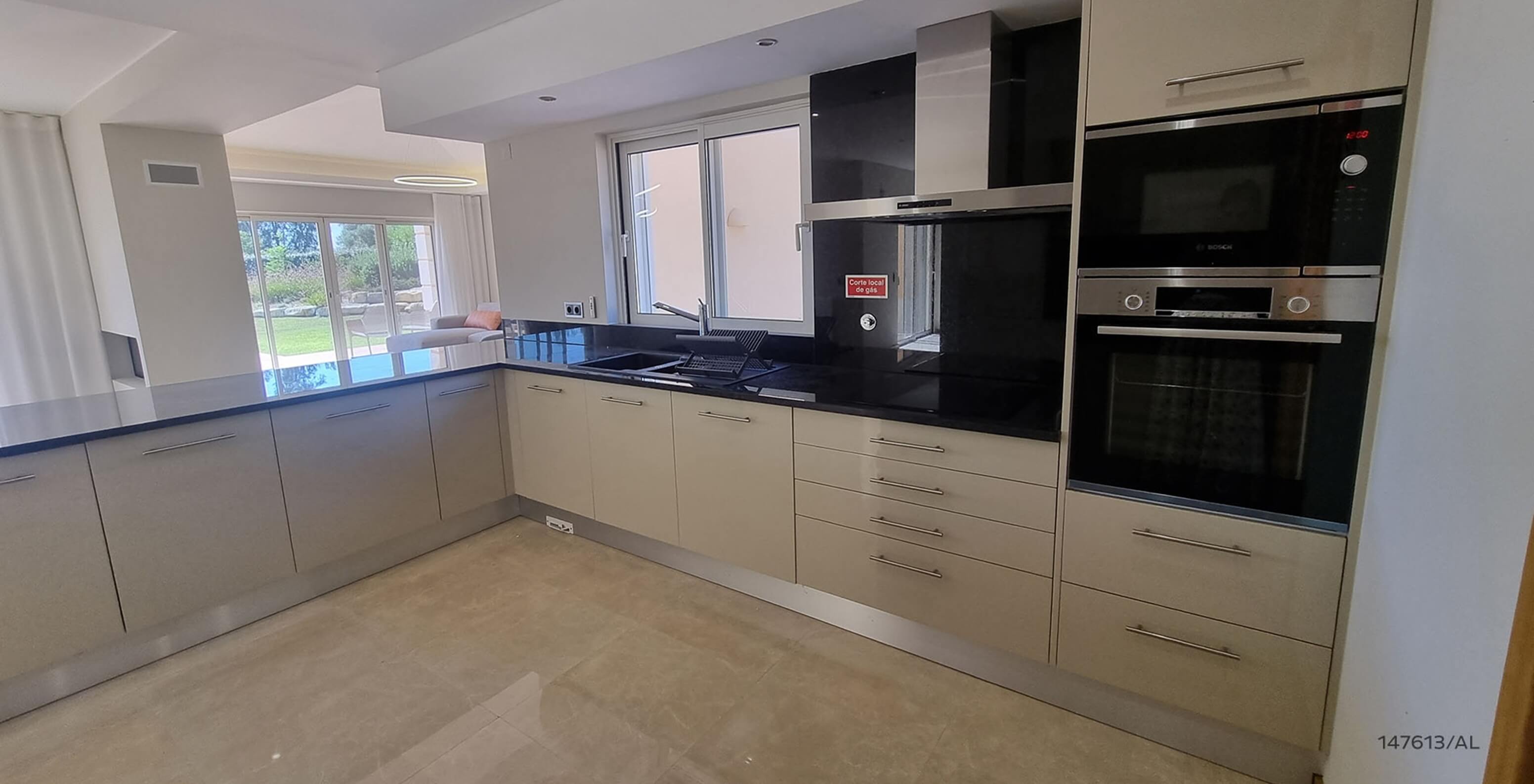 The Pestana Carvoeiro Golf V5 Standard Villa has a modern kitchen equipped with appliances