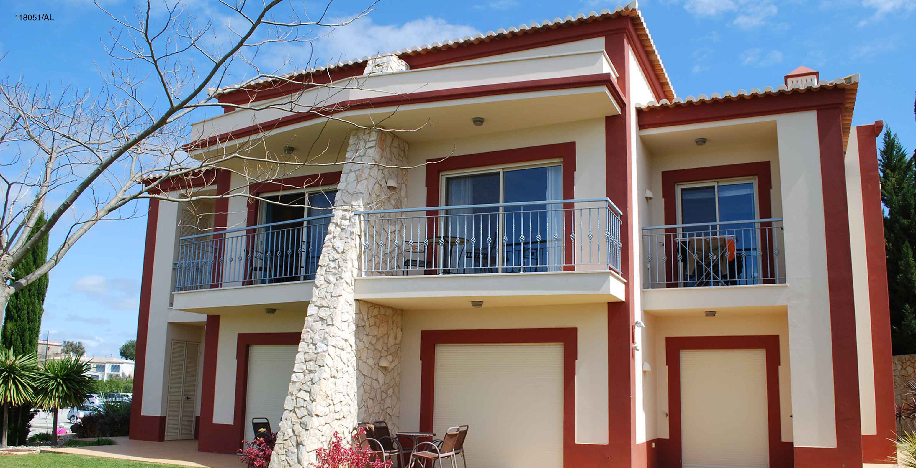 The Pestana Carvoeiro Golf T1 Superior Apartment has an exterior patio with a balcony and grass