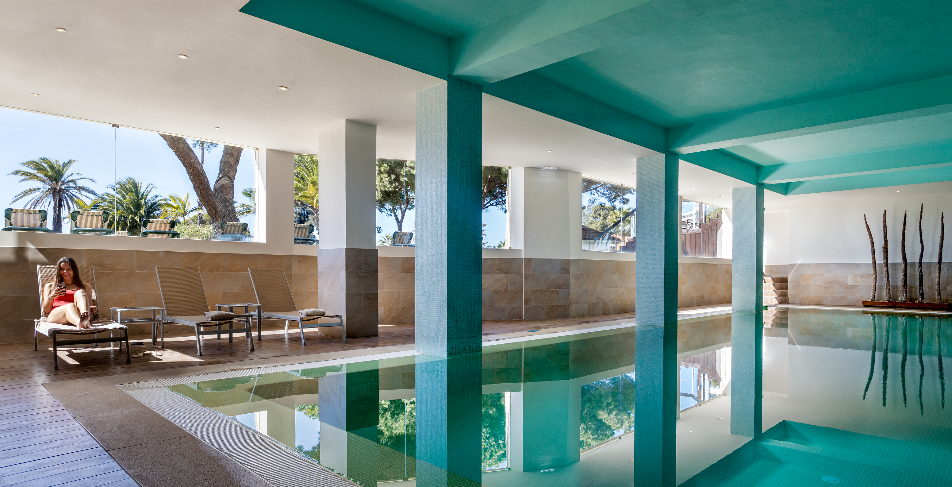 Pestana Dom João II, a 4-star hotel in Alvor, features an indoor pool and sun loungers around the pool