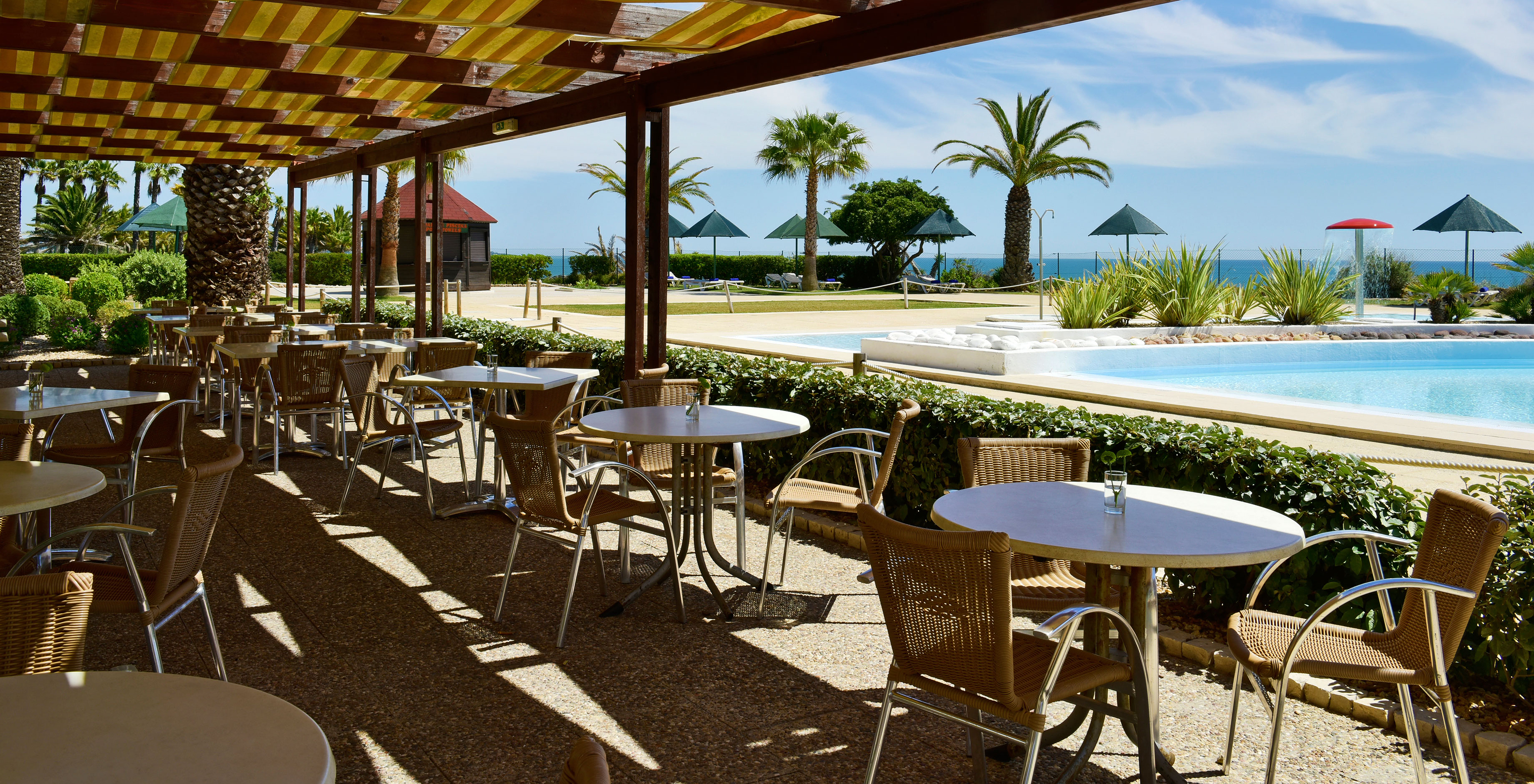 The Pool Bistro restaurant at the 4-Star Hotel in Porches has a terrace over the pool where you can order snacks