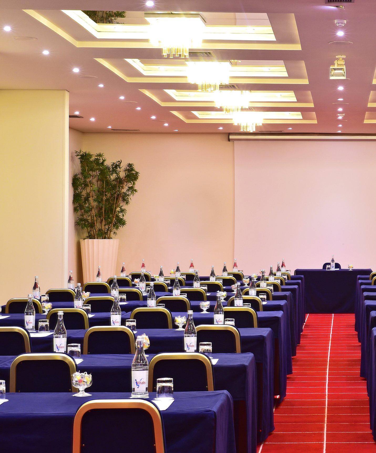 Pestana Cascais hotel by the sea with pool and spa has a meeting room with blue chairs and tables