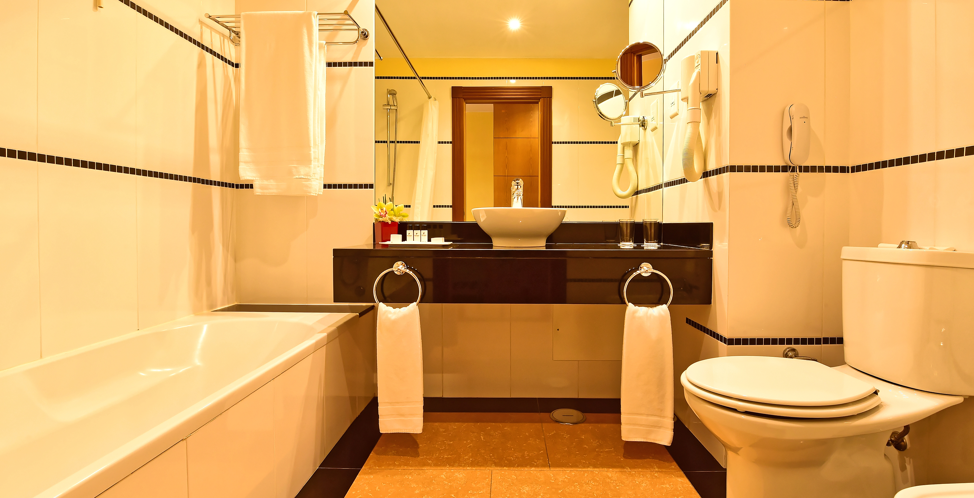 The Superior Double of Pestana Sintra Golf has a bathroom with bathtub, sink with mirror, amenities, and toilet