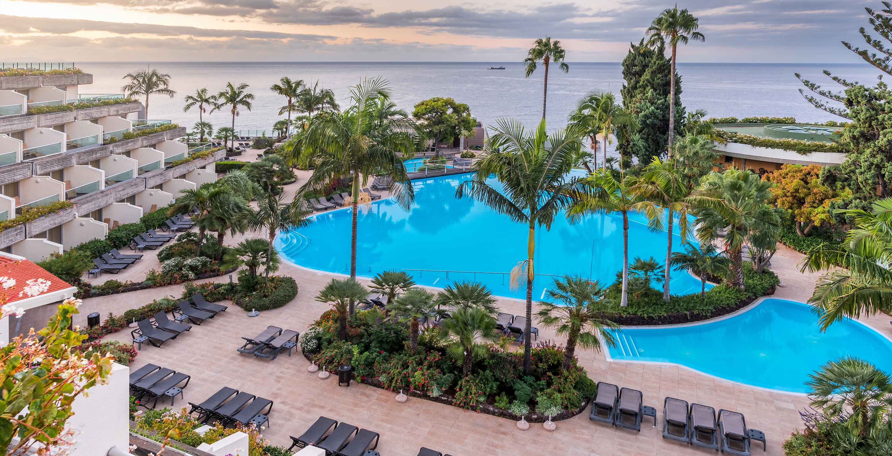 Sea view of the Pestana Carlton Madeira, with its large pool and surrounded by nature