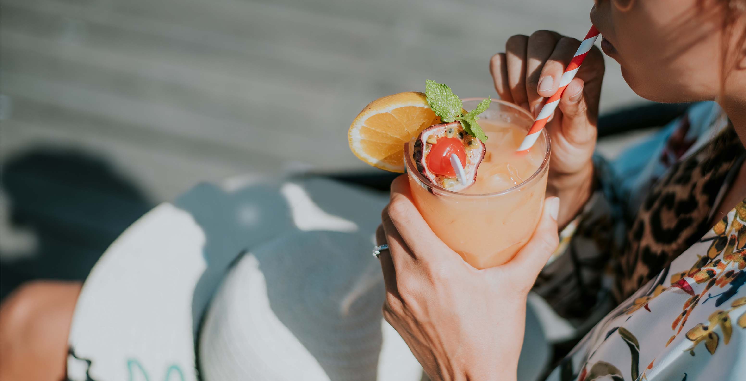 The On restaurant at the 5-Star Hotel in central Funchal features a cocktail decorated with passion fruit, mint, and orange