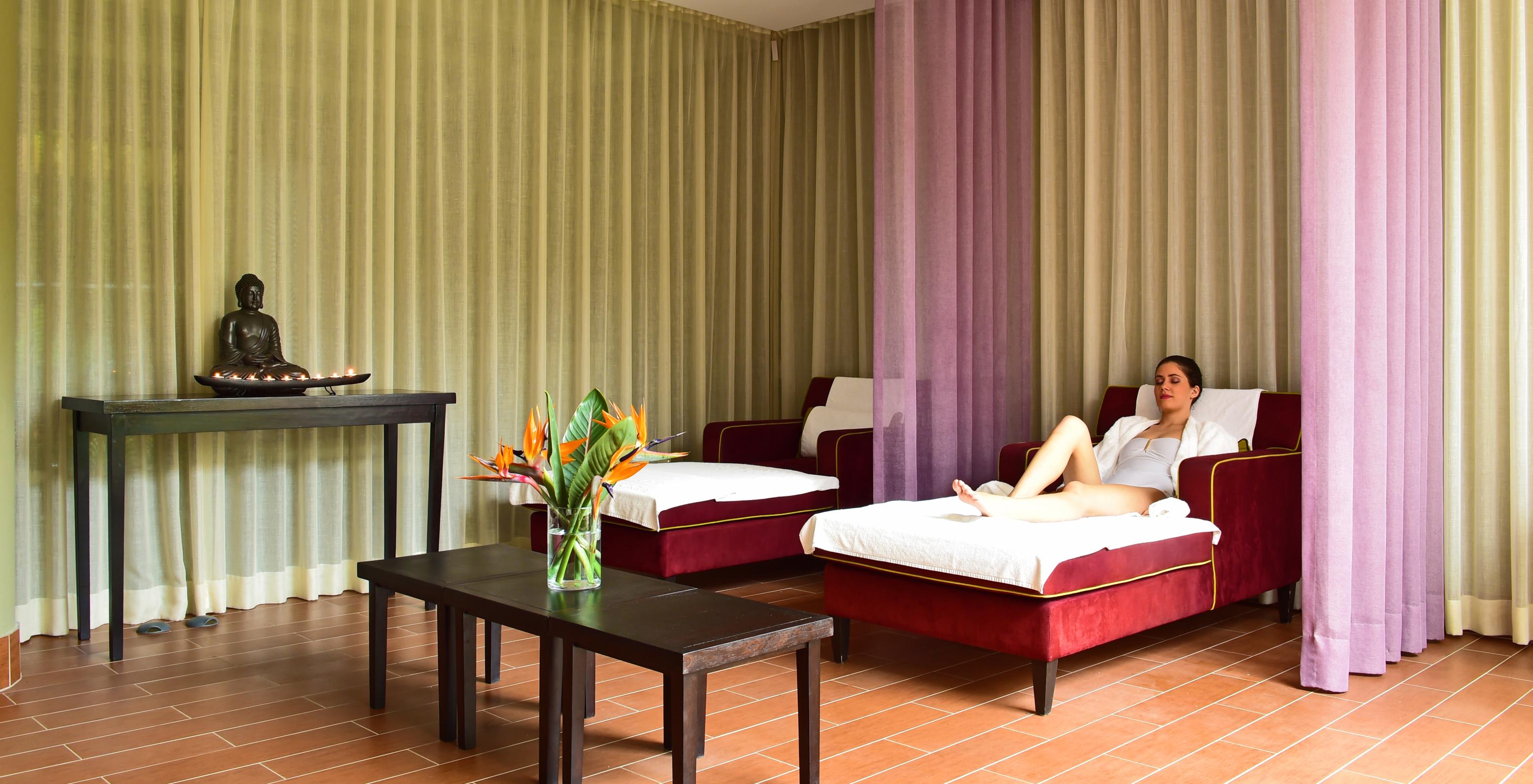 Pestana Promenade, a hotel in Madeira near the beach and Lido, has a spa with beds to relax after a massage