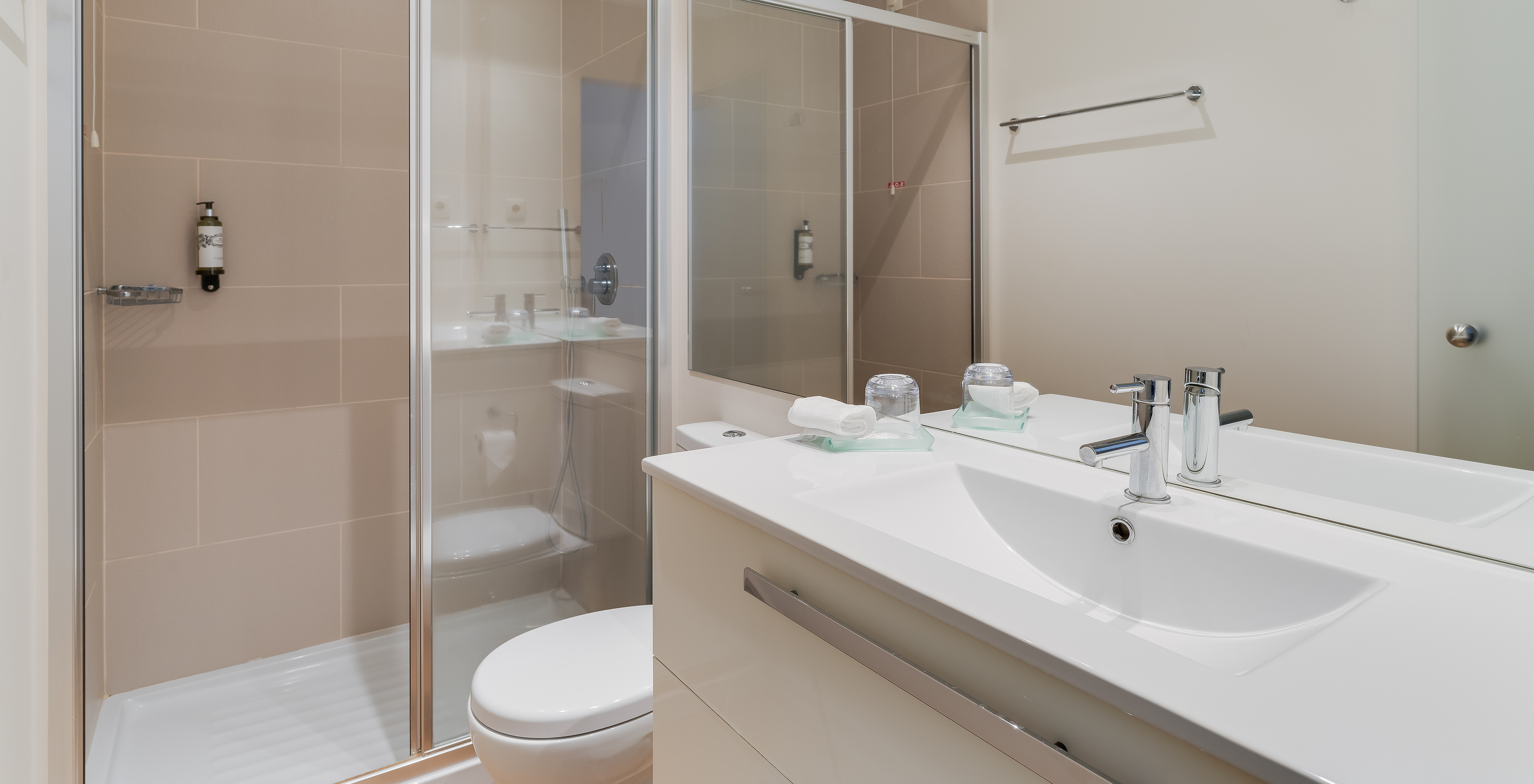 The Classic Twin Promenade View of Pestana Promenade has a bathroom with shower, toilet, and sink