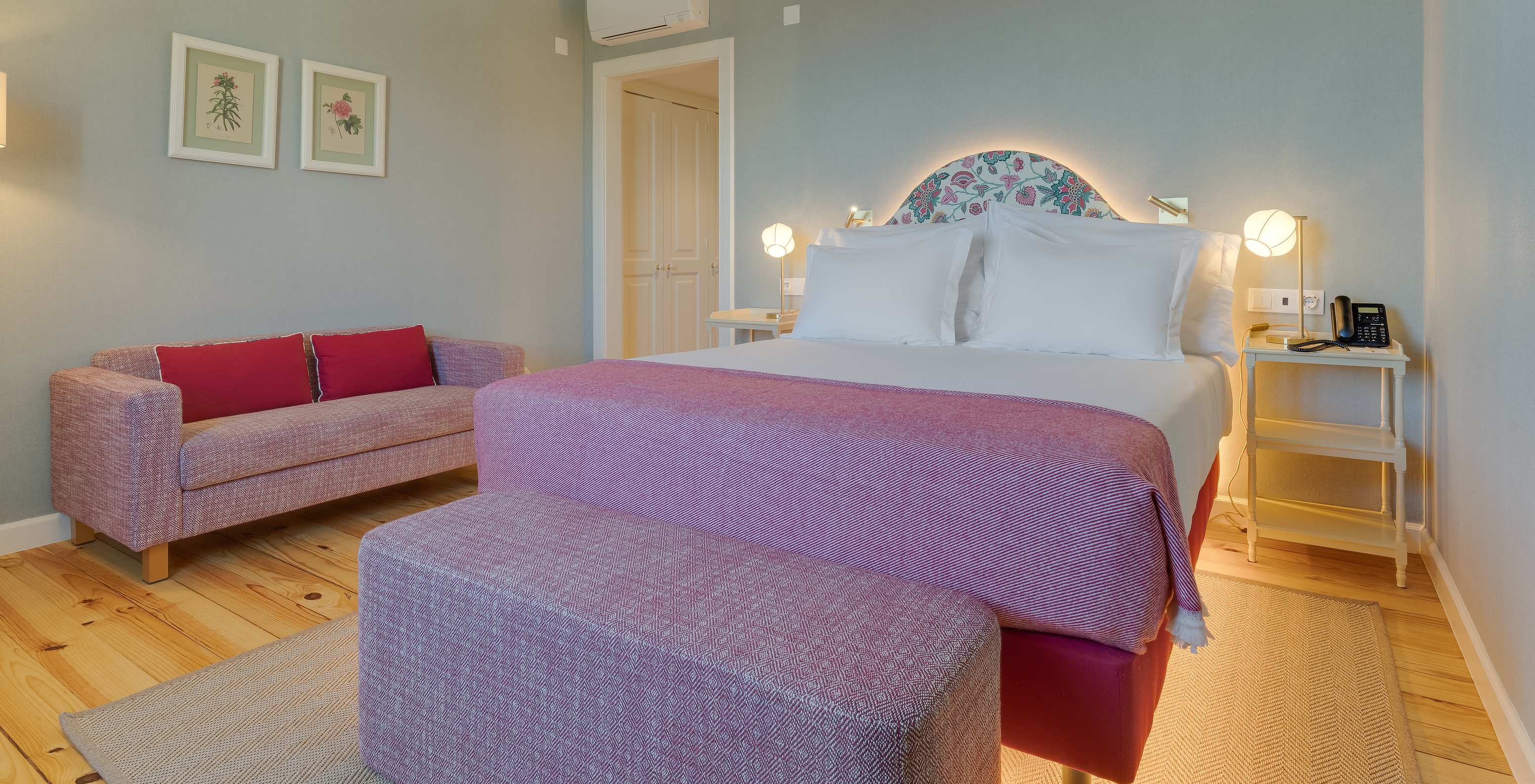 Partial Sea View room at Pestana Quinta Perestrello has a double bed, bedside table, and a sofa