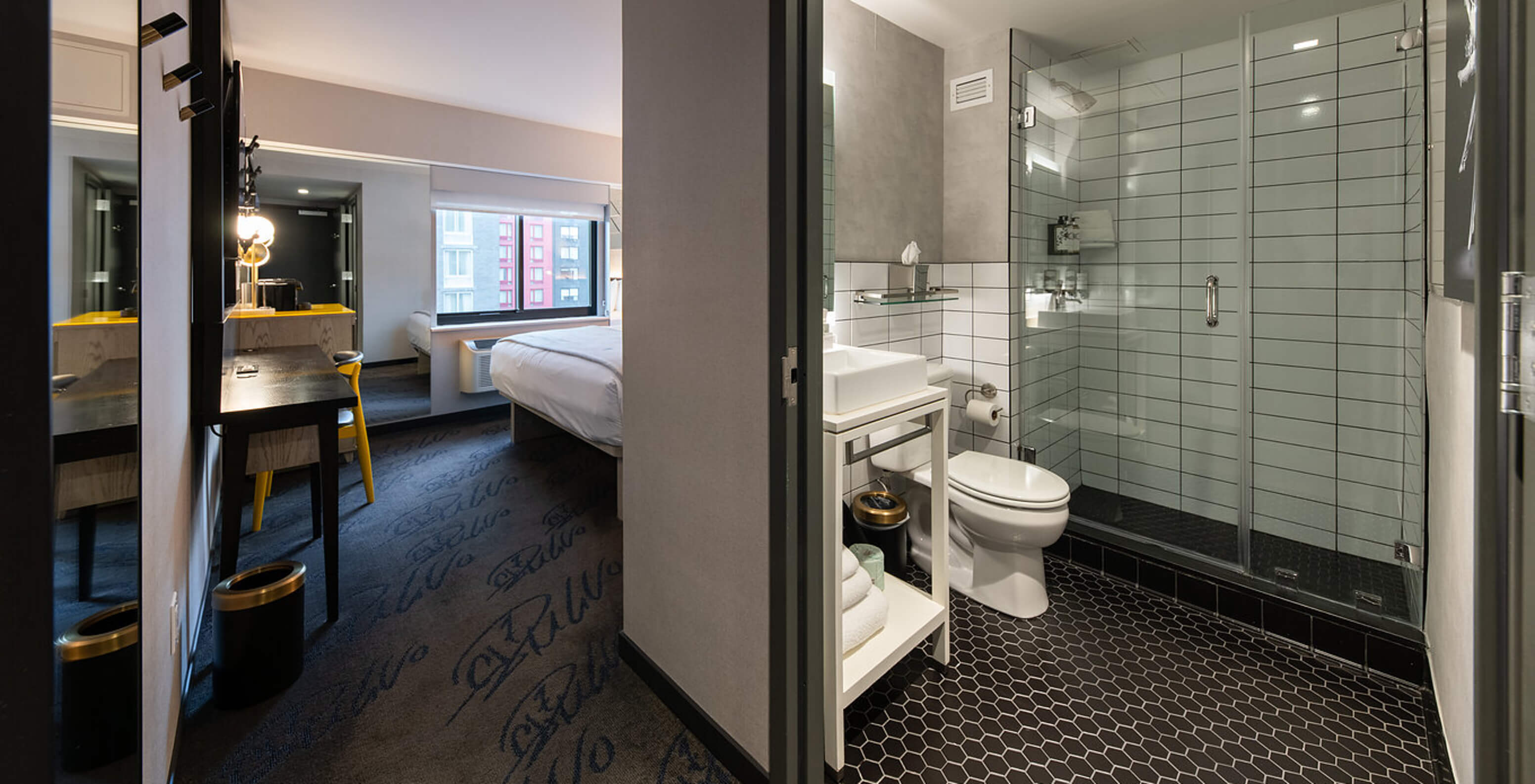 The Superior King High Floor at Pestana CR7 Times Square has an en-suite bathroom and a window at the end