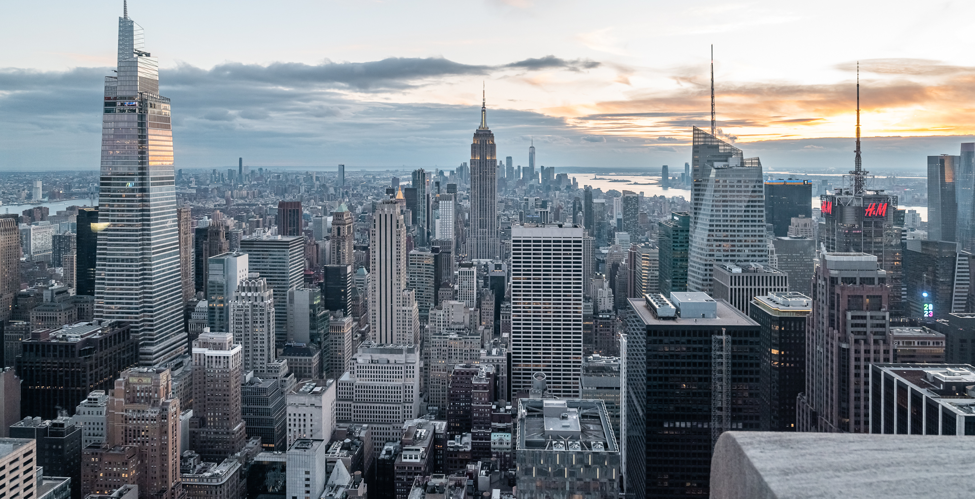 Panoramic view of Manhattan skyline with the Empire State Building among the skyscrapers