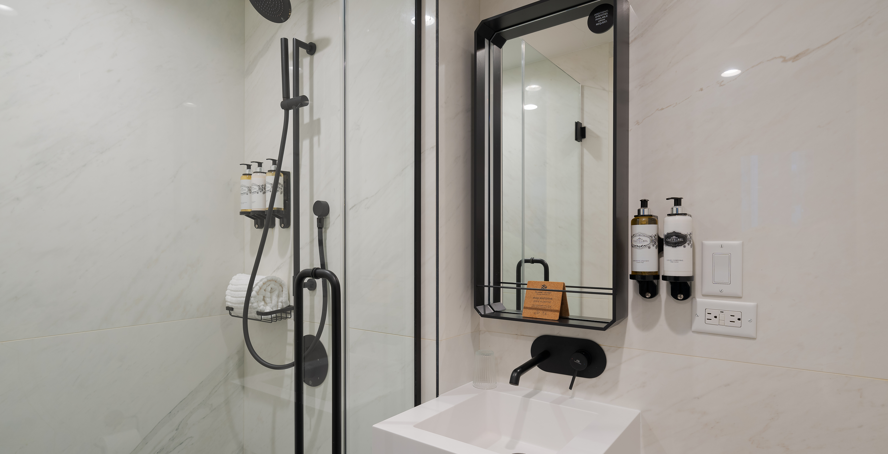 The Cabin room at Pestana Park Avenue has a bathroom with shower, sink and mirror