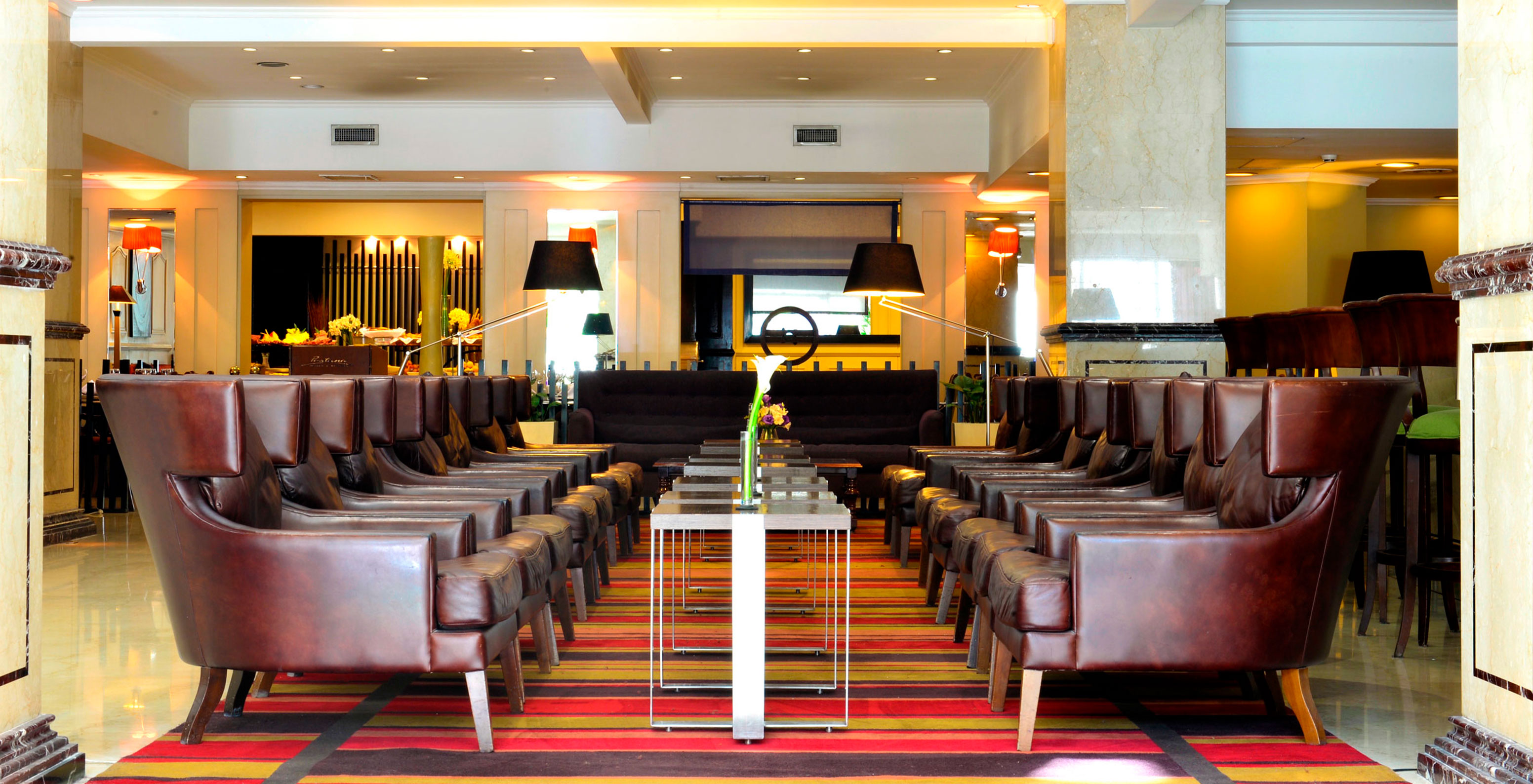 Pestana Buenos Aires, in the city center, has an entrance lobby with several comfortable chairs