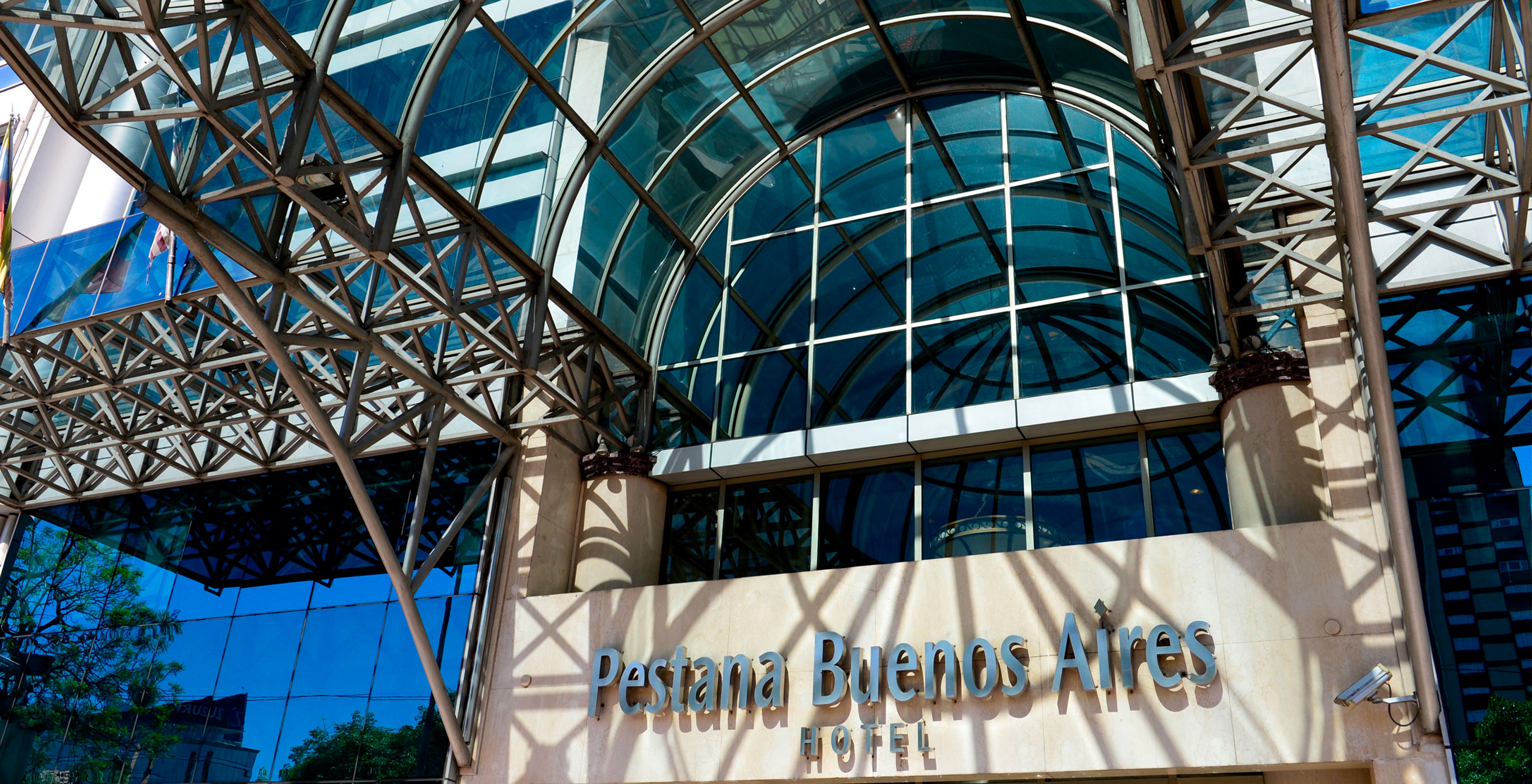 Pestana Buenos Aires entrance with large glass windows, metal structure