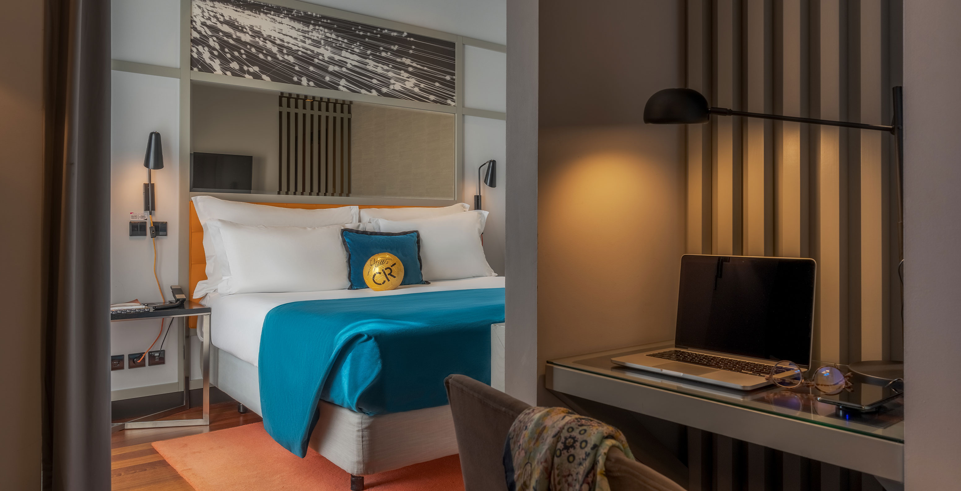 The CR7 Superior Rooftop Room at Pestana CR7 Lisboa features a desk, double bed, and a CR7 football