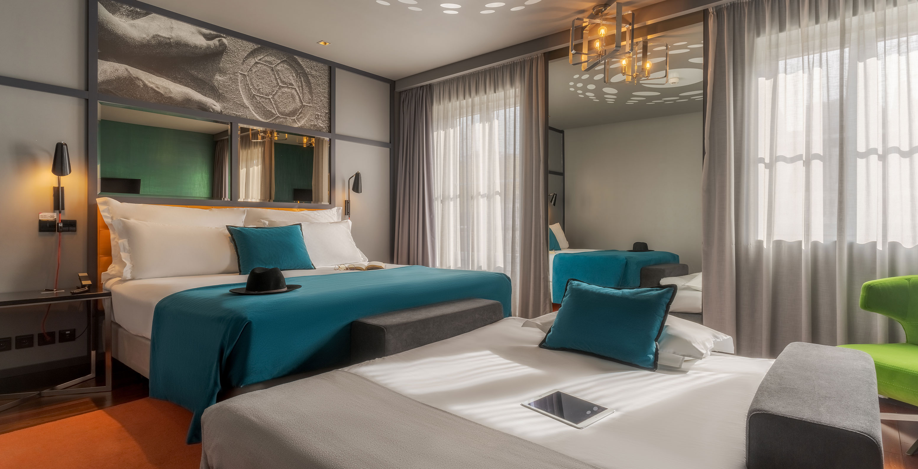 The CR7 Family Hat-Trick Room at Pestana CR7 Lisboa features two beds: a double bed and a sofa bed