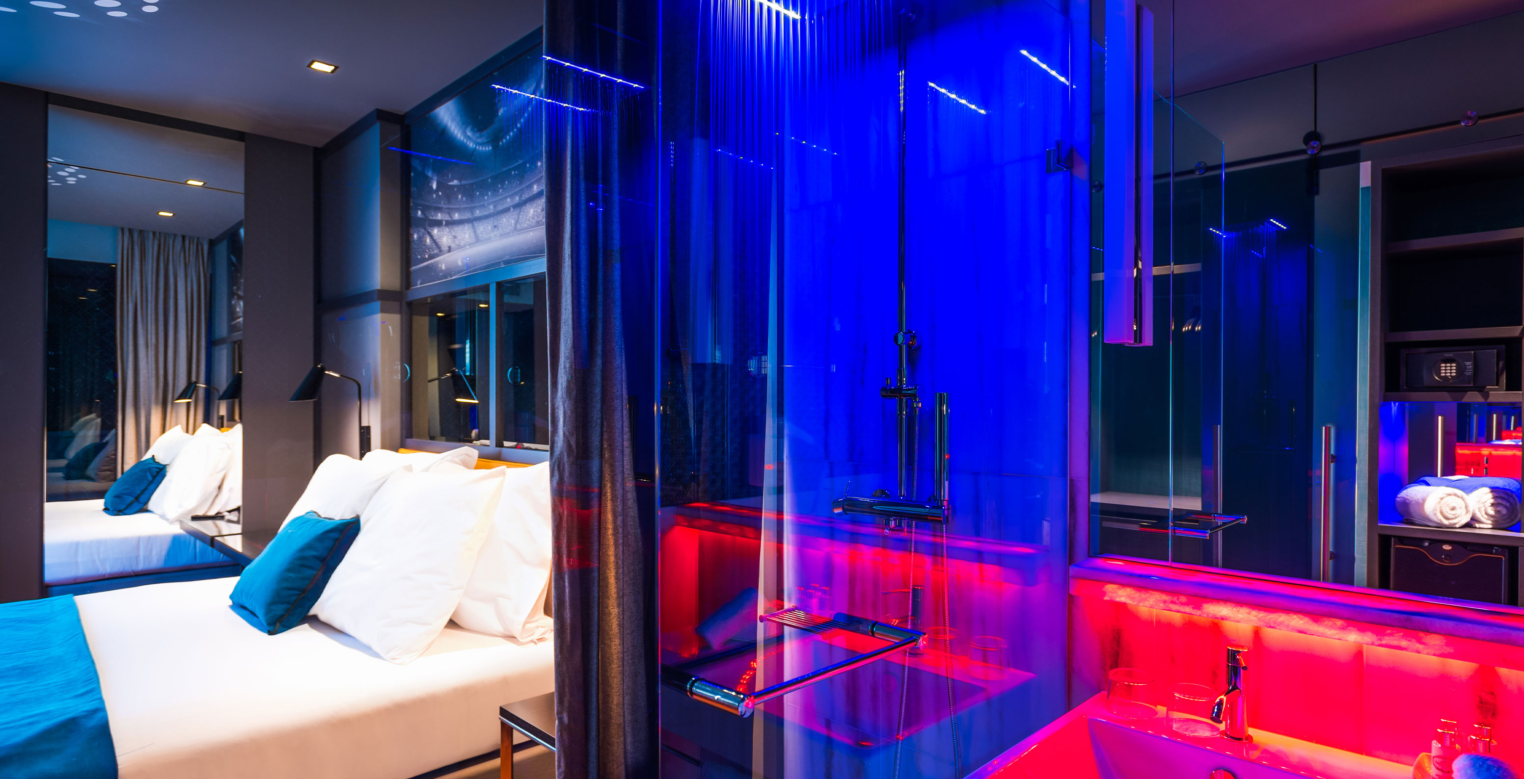 The CR7 Superior Room at Pestana CR7 Lisboa includes a double bed and shower with LED lights