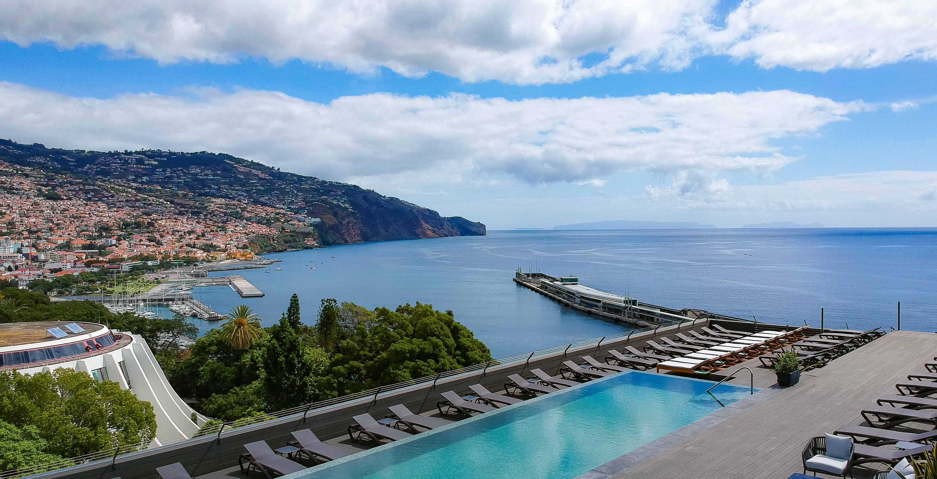 Aerial view of the pool and scenery from Pestana Casino Park, a hotel in Funchal by the sea, with spa and pool