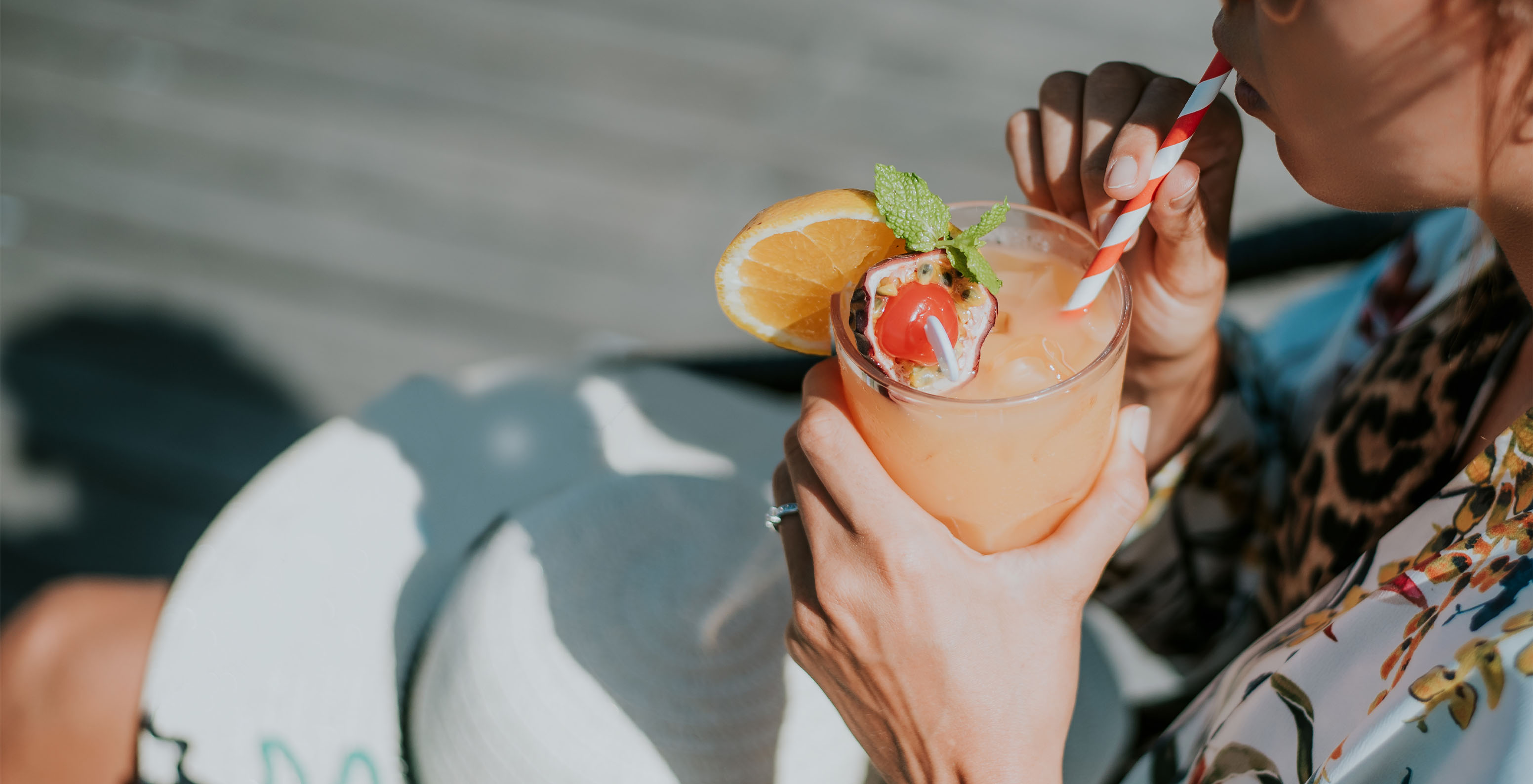 The On restaurant at the hotel in Funchal, Madeira, features a cocktail decorated with passion fruit, mint, and orange