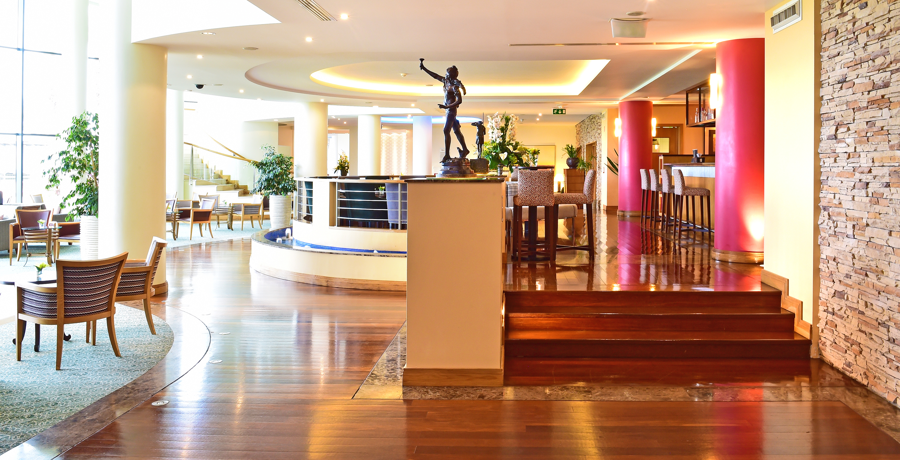 The Coast Bar at the 5-Star Hotel in Funchal, Madeira, has a counter space with chairs to order drinks