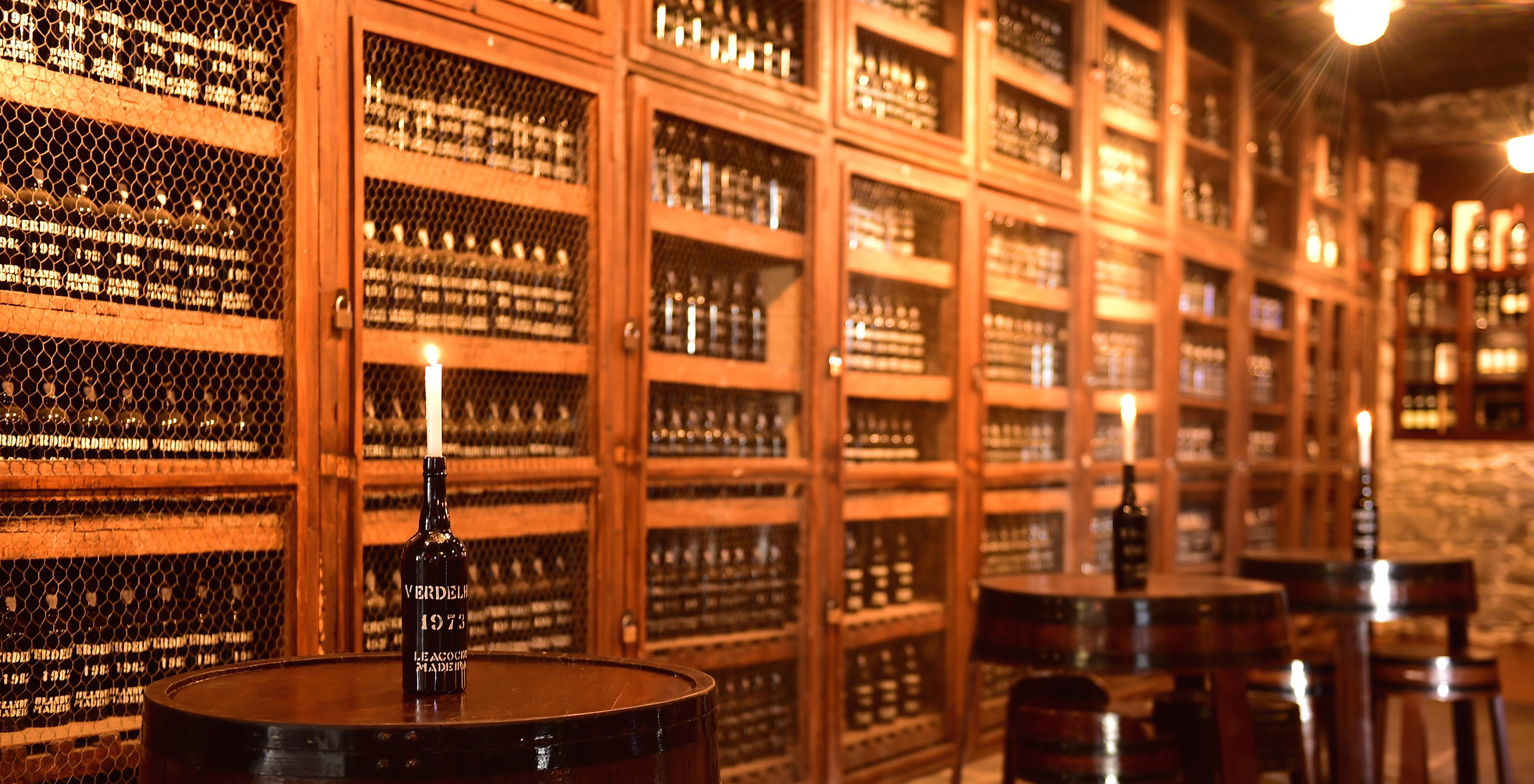 Dark cellar with various types of wine at Pestana Miramar, a hotel in Madeira near the beach