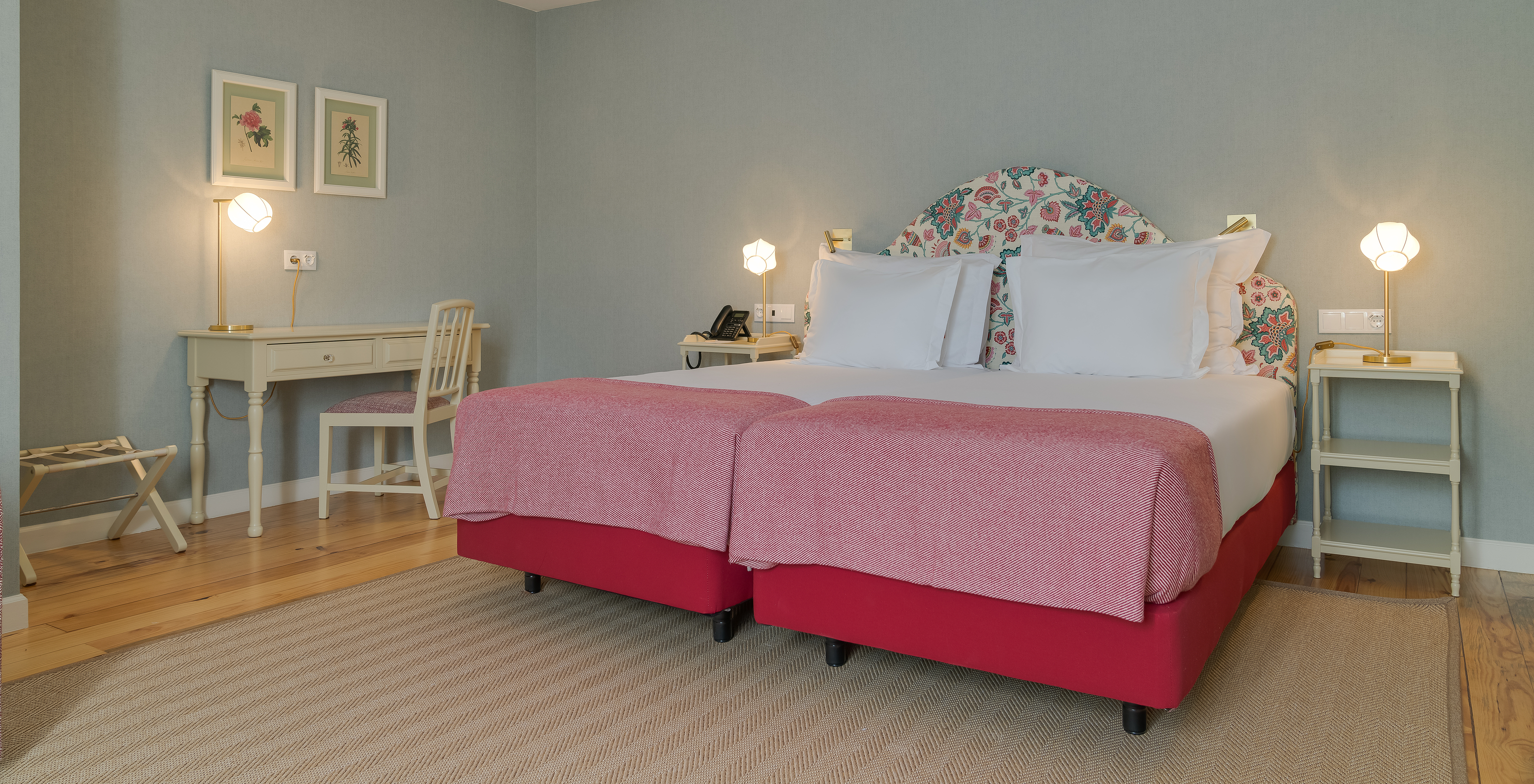 Junior Suite at Pestana Quinta Perestrello has two single beds, bedside table, and a desk