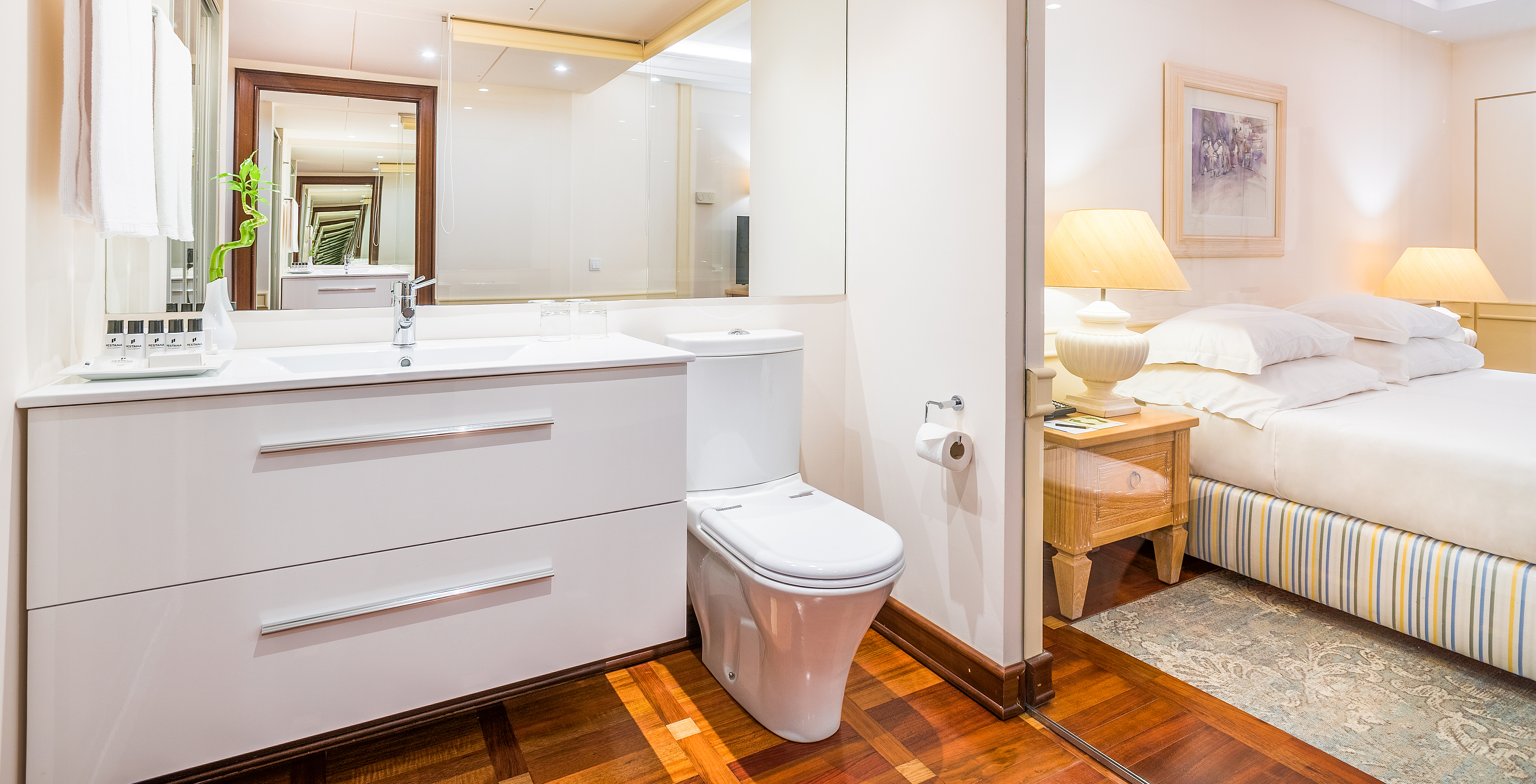 The Superior Deluxe Room with Balcony of Pestana Royal All Inclusive has a bathroom with mirror, sink, and toilet