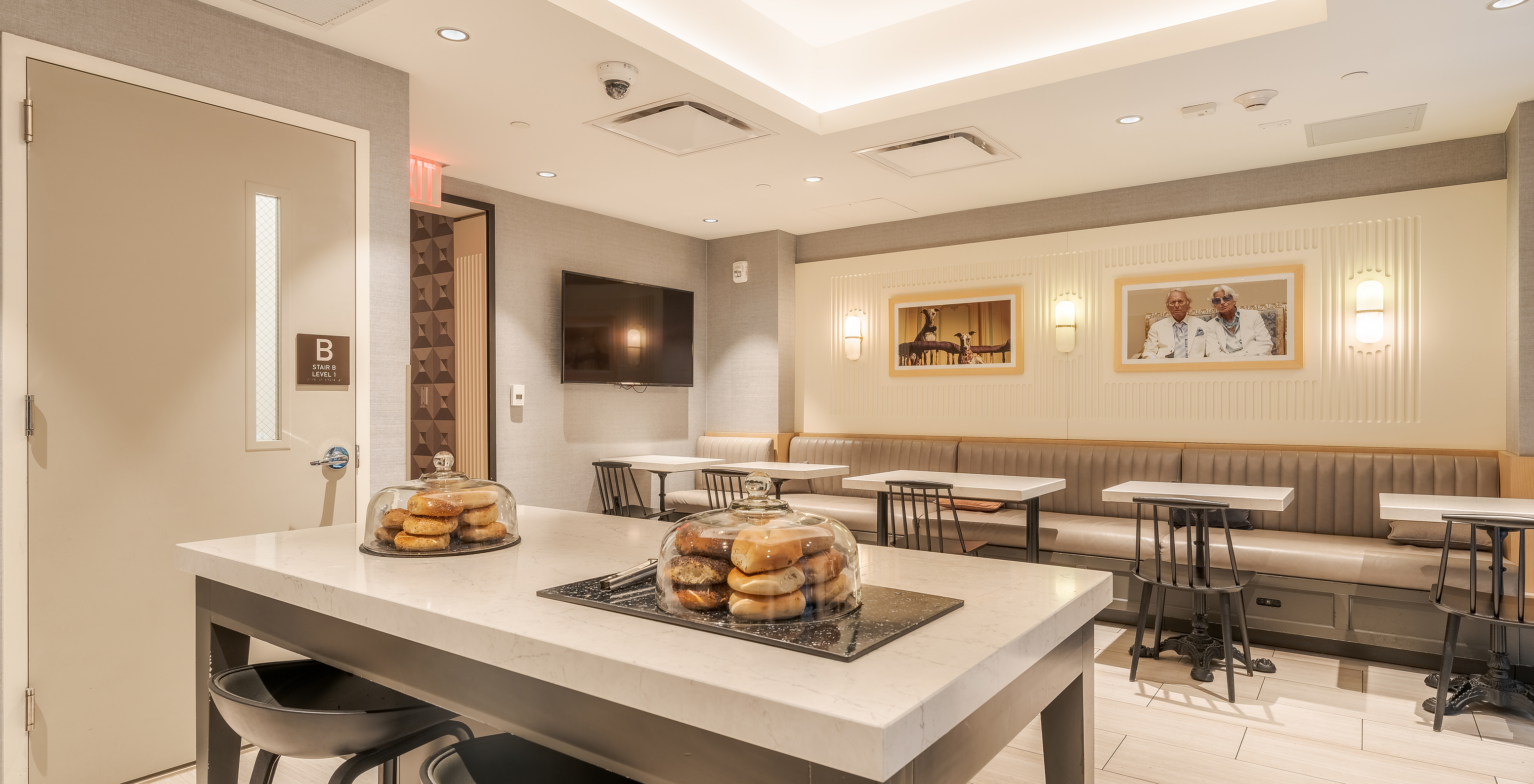 The Grab and Go restaurant at the Boutique Hotel in Manhattan, New York, offers quick meals with tables and chairs